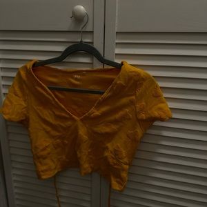 Pacsun- yellow crop tied tee size (s) with butterfly pattern all over